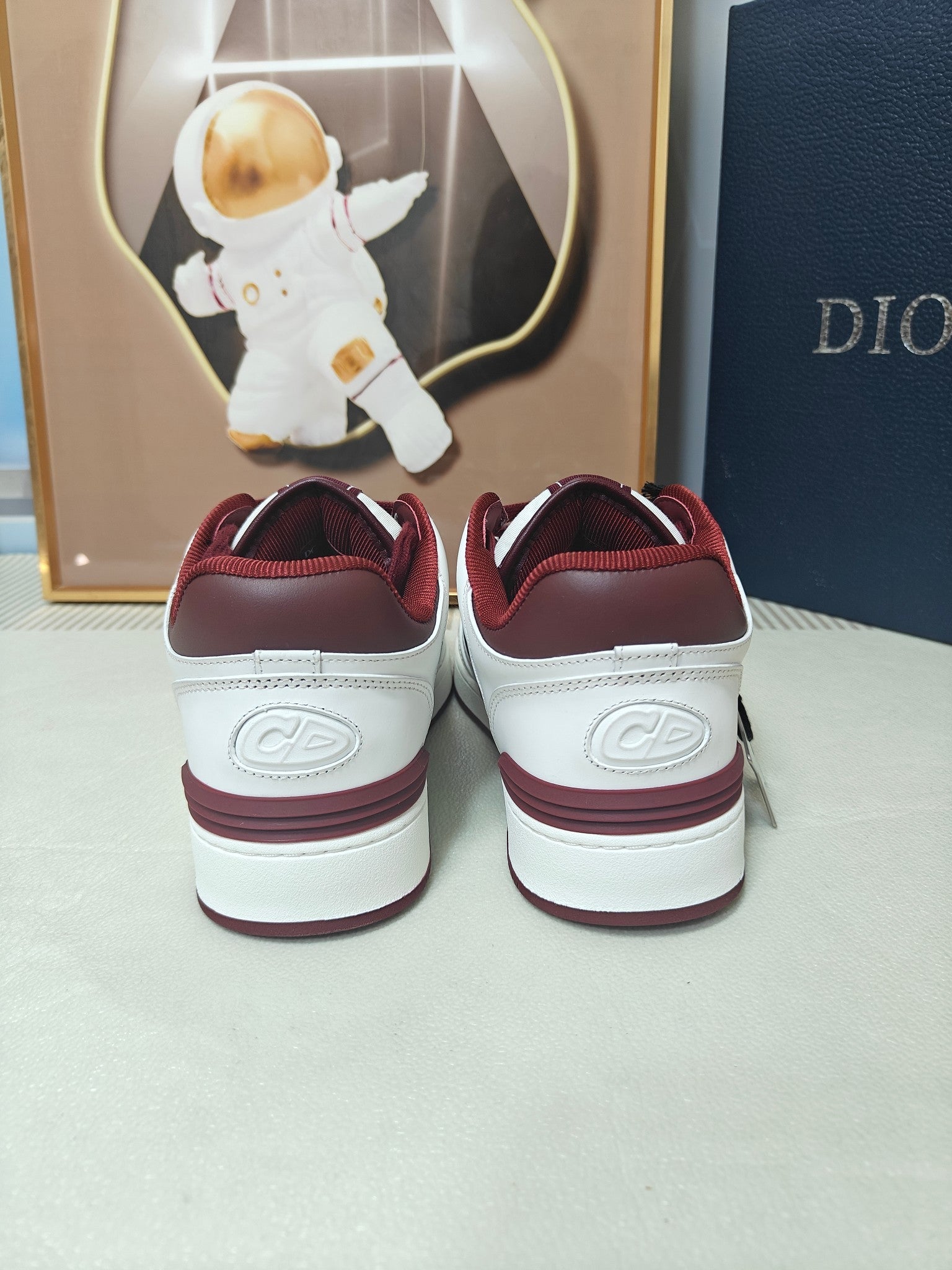 DIOR 26S LOW-TOP SNEAKER IN WHITE AND DARK RED CALFSKIN