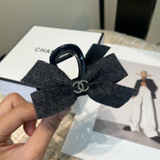 CHANEL 26S BOW HAIR CLIP IN BLACK RIBBON 505311
