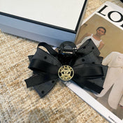 CHANEL 26S BOW HAIR CLIP IN BLACK RIBBON 505313