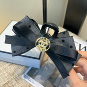 CHANEL 26S BOW HAIR CLIP IN BLACK RIBBON 505313