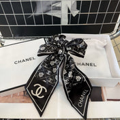 CHANEL 26S HAIR SCRUNCHIE IN BLACK SILK 503074