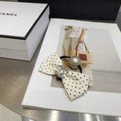 CHANEL 26S BOW HAIR TIE IN BLACK WITH WHITE POLKA DOTS 505301