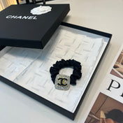 CHANEL 26S HAIR TIE IN BLACK FABRIC 503108