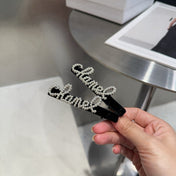 CHANEL 26S BOW HAIR CLIP IN BLACK RHINESTONE SCRIPT 505309