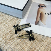 CHANEL 26S BOW HAIR CLIP IN BLACK FABRIC 505310