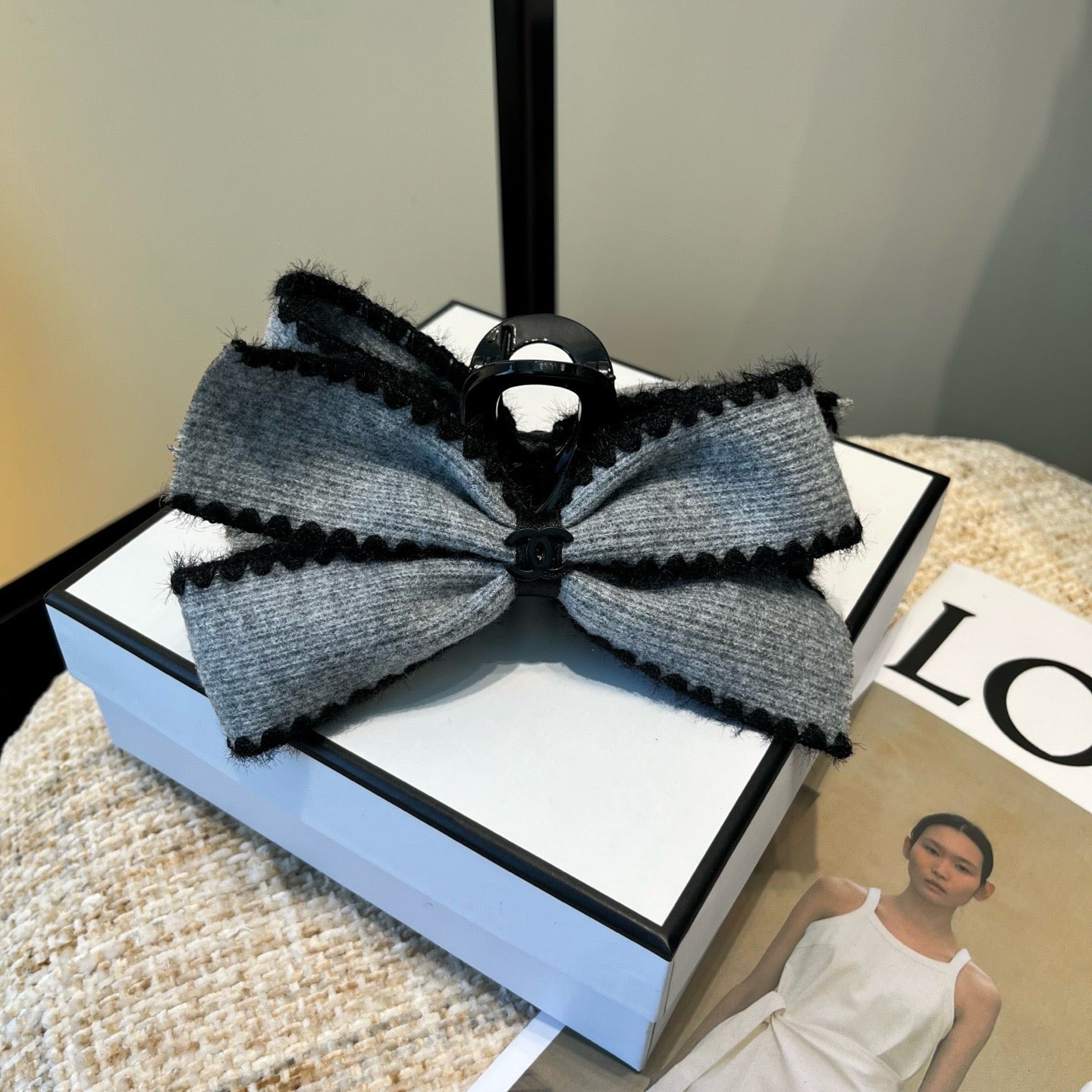 CHANEL 26S BOW HAIR CLIP IN GREY FABRIC 512107