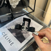 CHANEL 26S BOW HAIR CLIP IN BLACK RIBBON 512130
