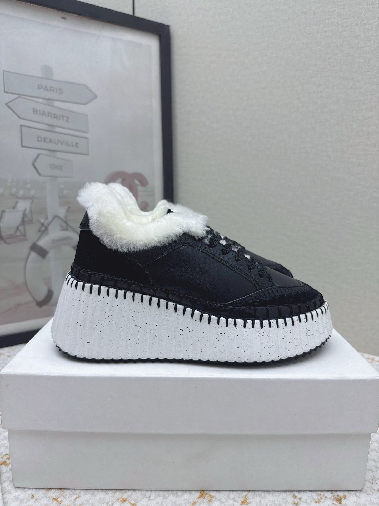 CHLOÉ 26S WEDGE SOLE SNEAKERS IN BLACK CALFSKIN