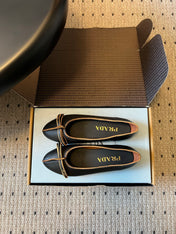 PRADA 26S POINTED TOE BOW FLATS IN BLACK CALFSKIN