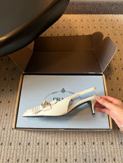 PRADA 26S POINTED TOE FRINGE BOW SLINGBACK PUMPS 55MM IN IVORY WHITE CALFSKIN
