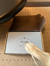 PRADA 26S POINTED TOE FRINGE BOW SLINGBACK PUMPS 55MM IN IVORY WHITE CALFSKIN