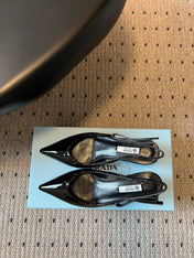 PRADA 26S POINTED TOE SLINGBACK HEELS 55MM IN BLACK PATENT CALFSKIN
