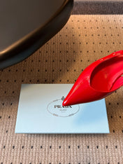 PRADA 26S POINTED TOE SLINGBACK HEELS 55MM IN RED PATENT CALFSKIN