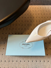 PRADA 26S POINTED TOE SLINGBACK HEELS 55MM IN WHITE PATENT CALFSKIN