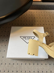 PRADA 26S BLOCK HEEL SANDALS 85MM IN BEIGE EVA FOAM