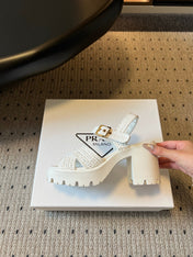 PRADA 26S BLOCK HEEL SANDALS 85MM IN WHITE RAFFIA AND CALFSKIN