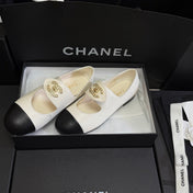 CHANEL 26S MARY JANE FLATS IN WHITE AND BLACK CALFSKIN WITH GOLD TONE CC LOGO