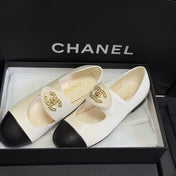 CHANEL 26S MARY JANE FLATS IN WHITE AND BLACK CALFSKIN WITH GOLD TONE CC LOGO