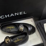 CHANEL 26S MARY JANE FLATS IN BLACK CALFSKIN WITH GOLD TONE CC LOGO