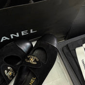 CHANEL 26S MARY JANE FLATS IN BLACK SUEDE AND CALFSKIN