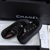 CHANEL 26S LOW TOP SNEAKERS IN BLACK SUEDE