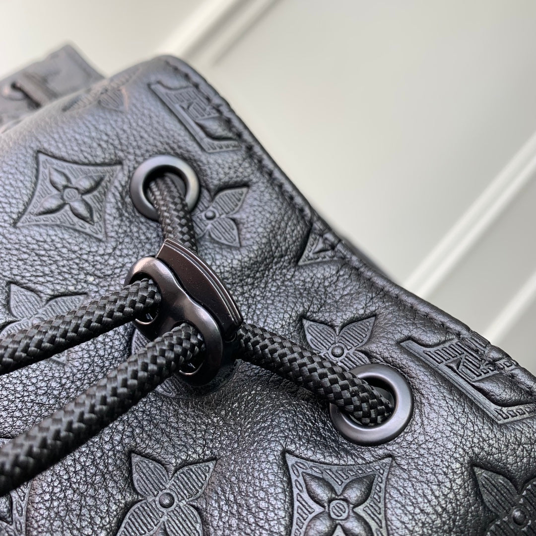 GETAWAY BACKPACK 50 IN BLACK MONOGRAM ECLIPSE CANVAS AND CALFSKIN EMBOSSED LOGO