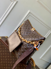 COUSSIN MM 38 IN CHOCOLATE MONOGRAM EMBOSSED CALFSKIN GOLD HARDWARE