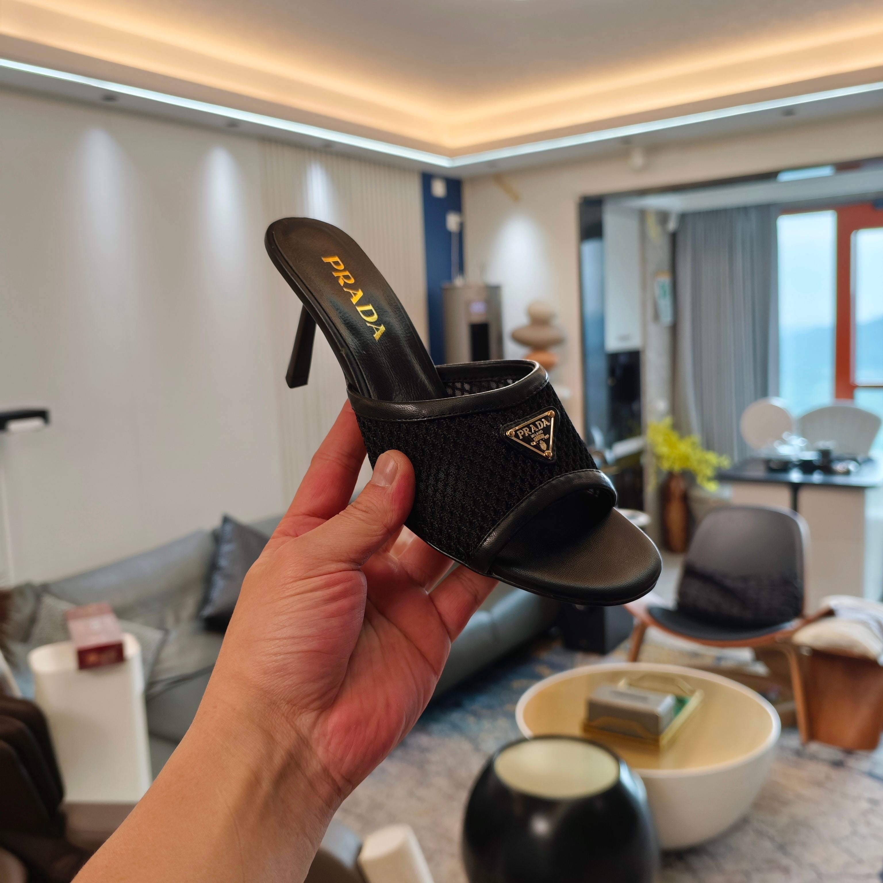 PRADA 26S MULE SANDALS 75MM IN BLACK CALFSKIN AND MESH GOLD HARDWARE
