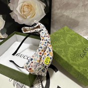 HAIRBAND IN WHITE FLORAL FABRIC 385855