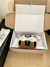 LOEWE 26S FLOW RUNNER SNEAKER IN BLACK SUEDE AND WHITE SHEEPSKIN