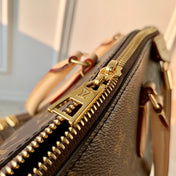 BOÉTIE PM TOTE 25 IN BROWN MONOGRAM COATED CANVAS AND CALFSKIN