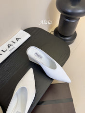 ALAIA HIGH MULES 25S IN WHITE SATIN