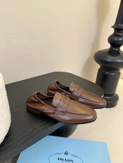 PRADA 25S SHUFFLE LOAFERS IN EARTH BROWN CALFSKIN