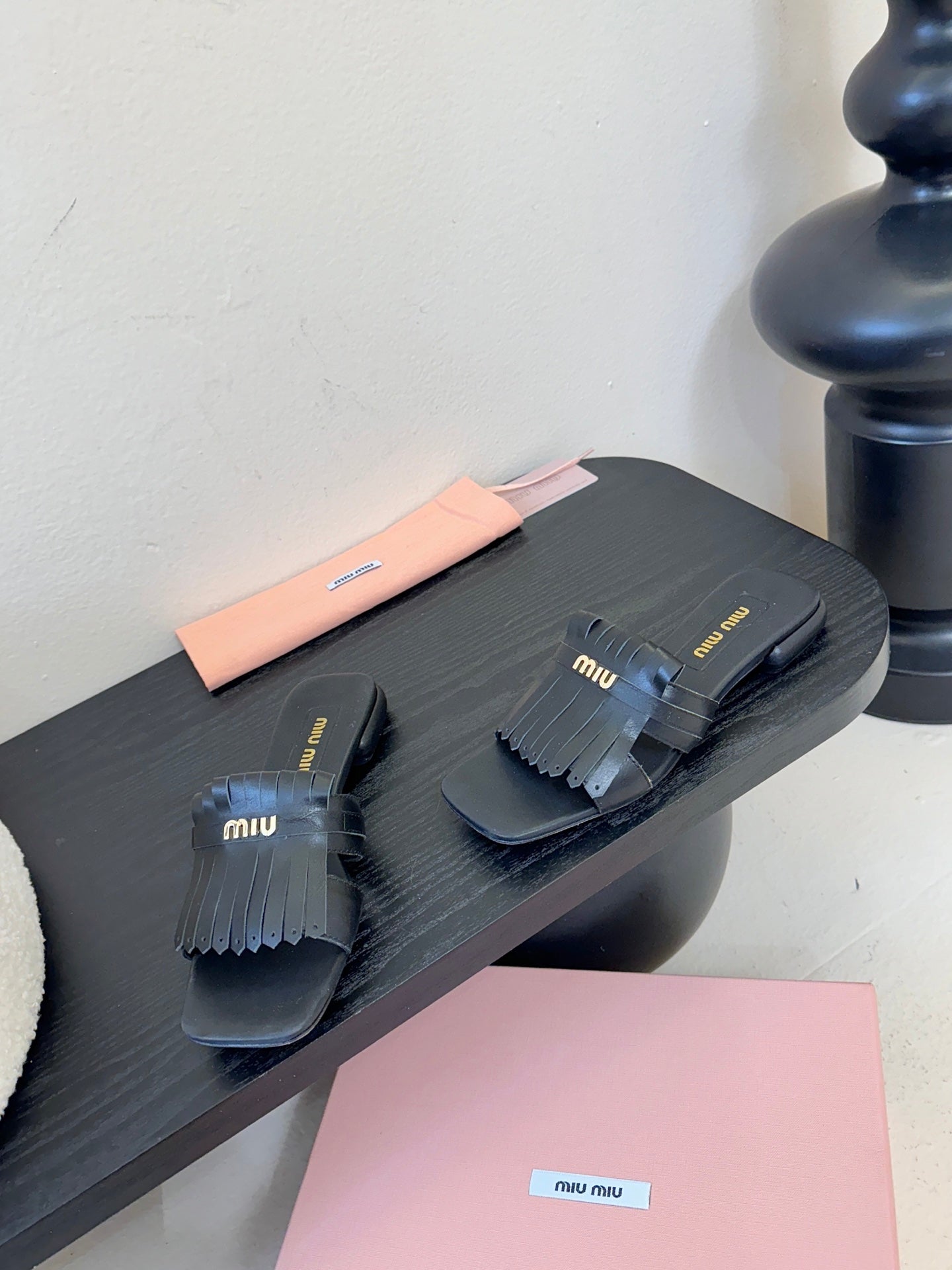 MIUMIU 26S FLAT SLIPPERS IN BLACK CALFSKIN