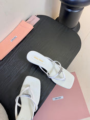 MIUMIU 26S LOW-HEEL THONG SANDALS IN WHITE CALFSKIN