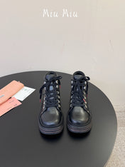 MIUMIU 26S ANKLE MOUNTAIN BOOTS IN BLACK CALFSKIN