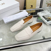 THE ROW 26S PENNY LOAFER FLATS IN IVORY WHITE GRAINED CALFSKIN