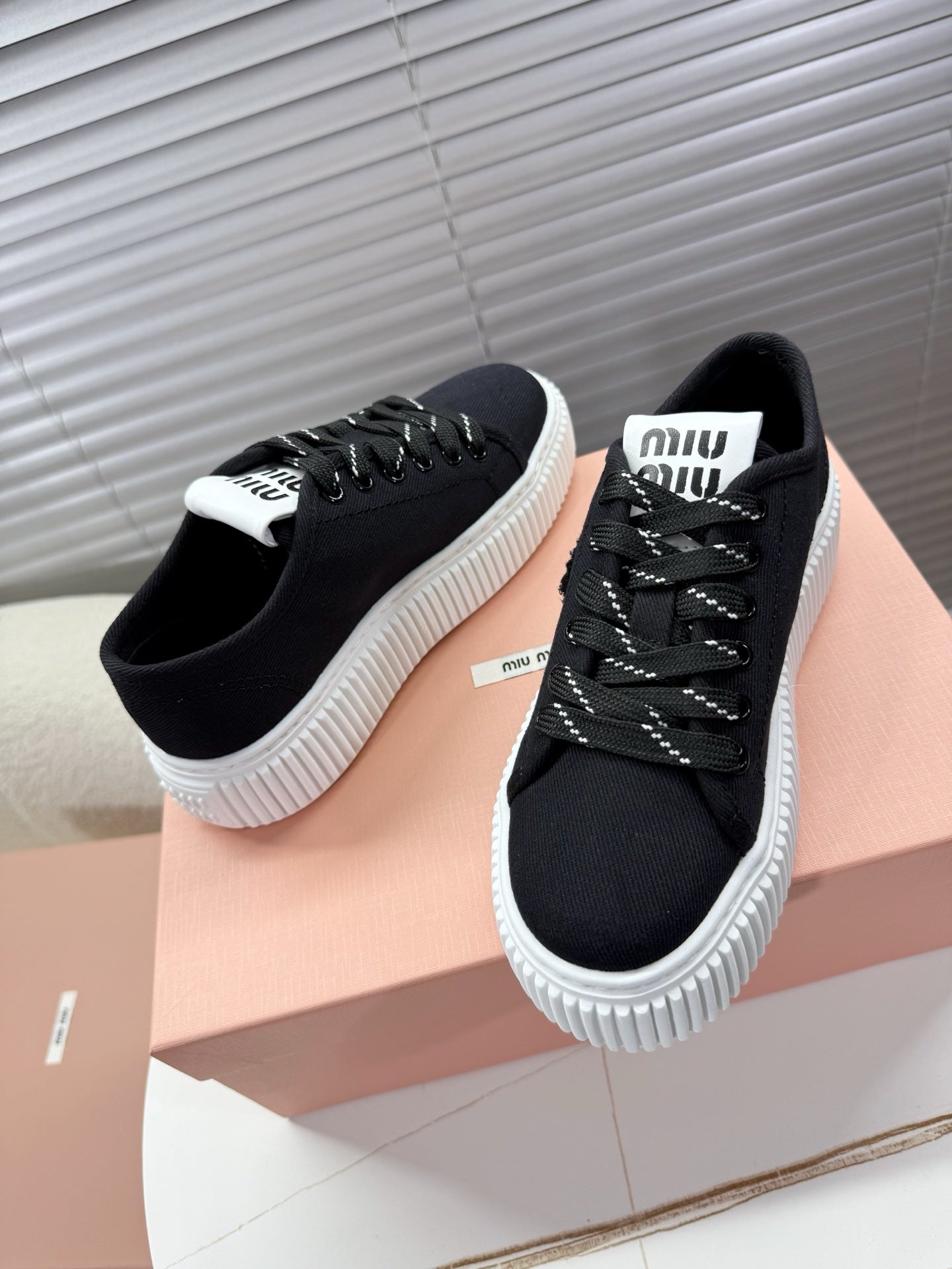 MIUMIU 26S PLATFORM SNEAKERS IN BLACK CANVAS