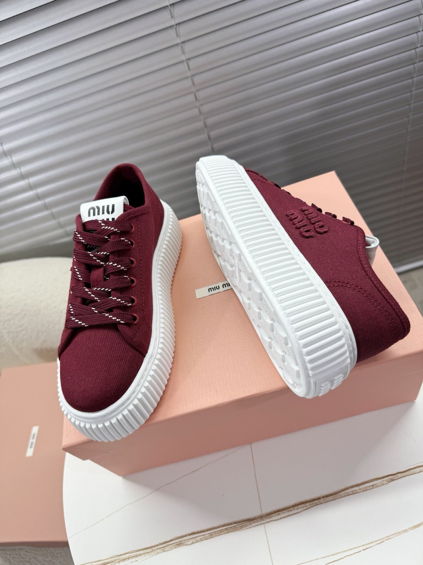 MIUMIU 26S PLATFORM SNEAKERS IN DARK RED CANVAS