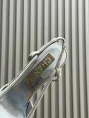 HIGH SLINGBACKS IN GREY SUEDE AND SILVER LAMBSKIN