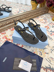 PRADA 26S THONG SANDALS IN BLACK CALFSKIN TRIANGLE LOGO
