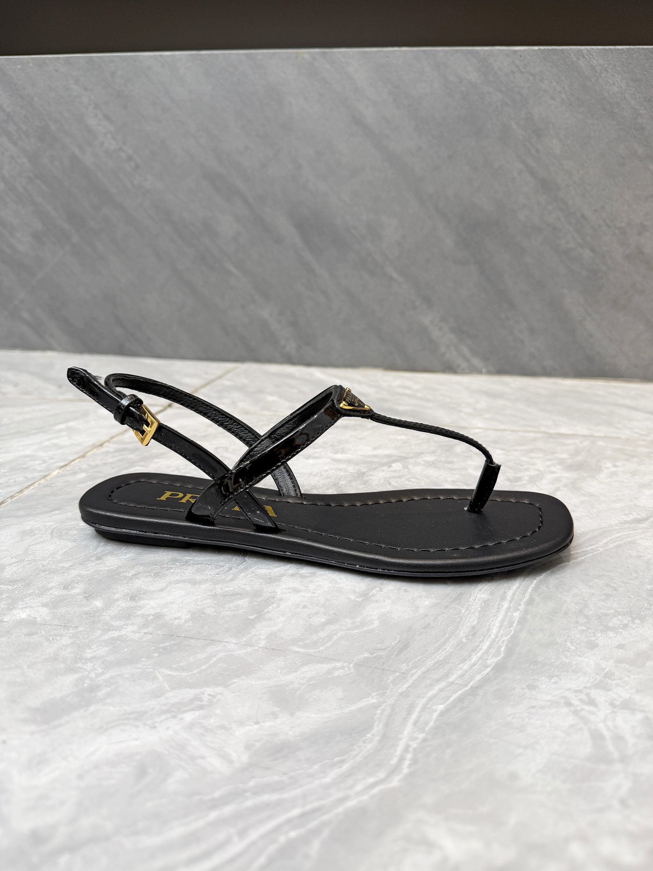 PRADA 26S THONG SANDALS IN BLACK CALFSKIN TRIANGLE LOGO