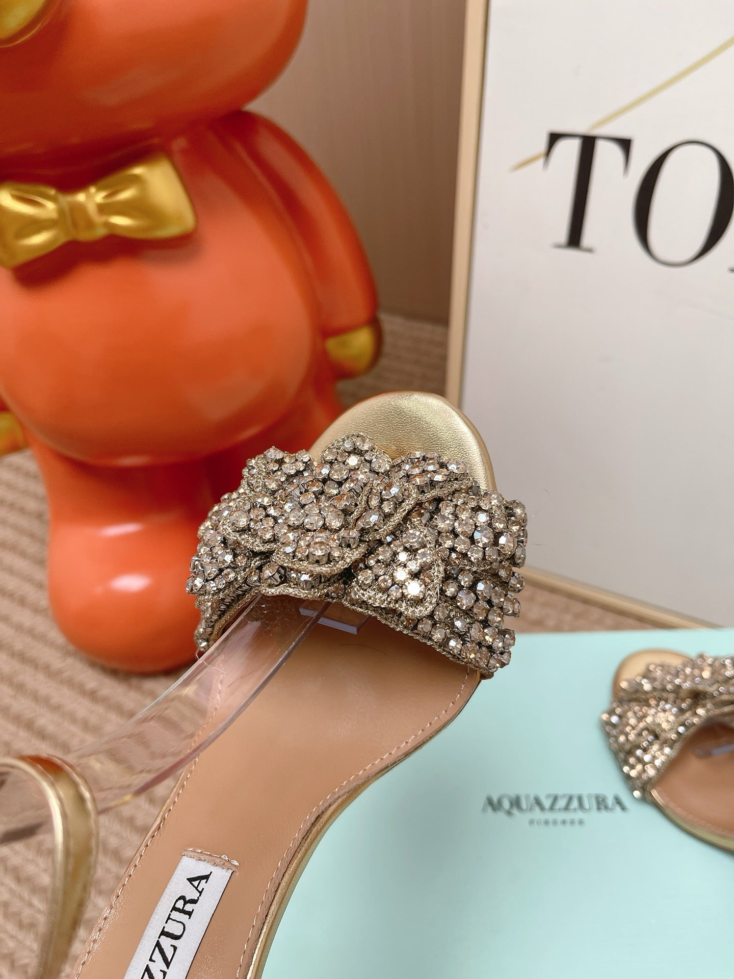 AQUAZZURA 26S HIGH-HEEL SANDALS 85 MM IN LIGHT GOLD LEATHER & CRYSTALS