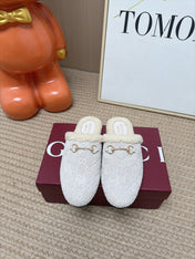 GUCCI 26S SHEARLING-LINED MULES IN OFF WHITE SUEDE