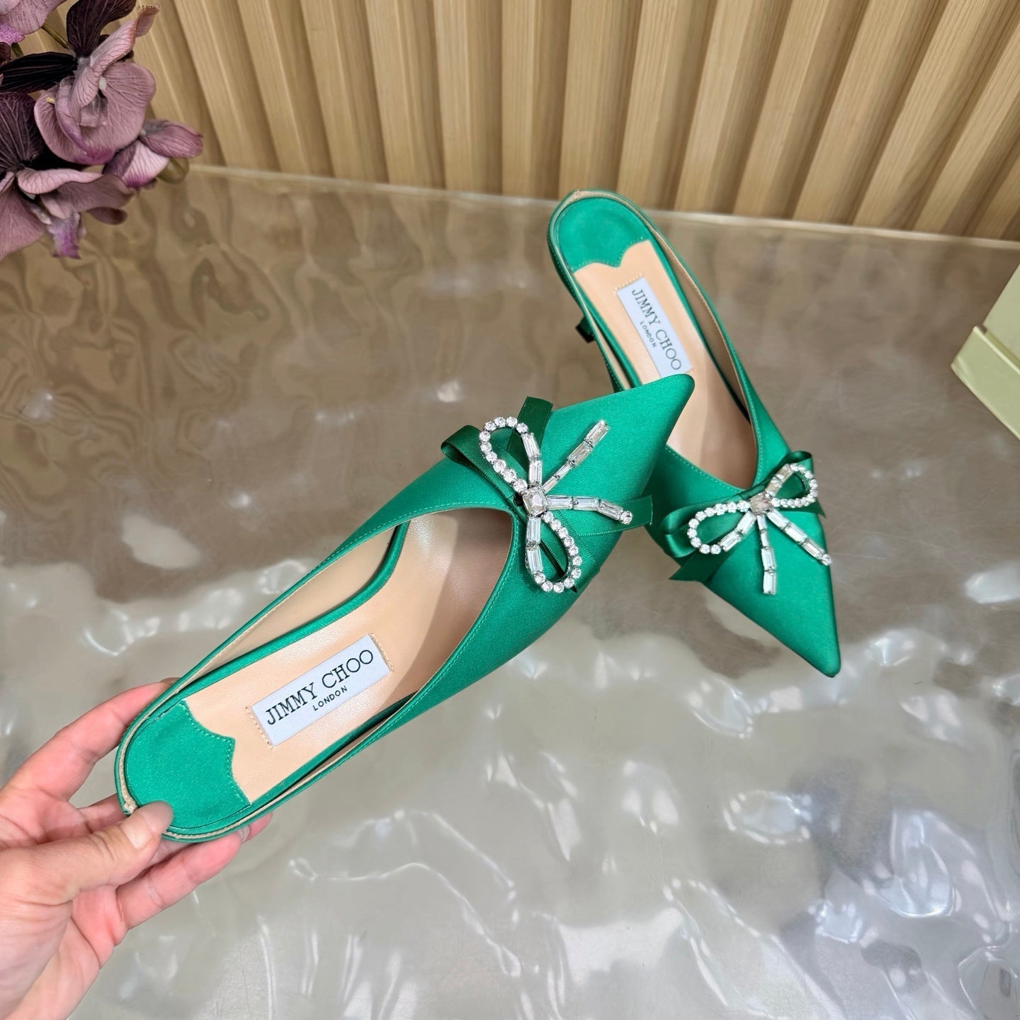 JIMMY CHOO 26S HIGH-HEELED MULES 65 MM IN GREEN SATIN WITH RHINESTONE BOW
