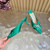 JIMMY CHOO 26S HIGH-HEELED MULES 65 MM IN GREEN SATIN WITH RHINESTONE BOW