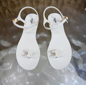 CELINE 26S TRIOMPHE JELLY THONG SANDALS IN WHITE TPU GOLD HARDWARE