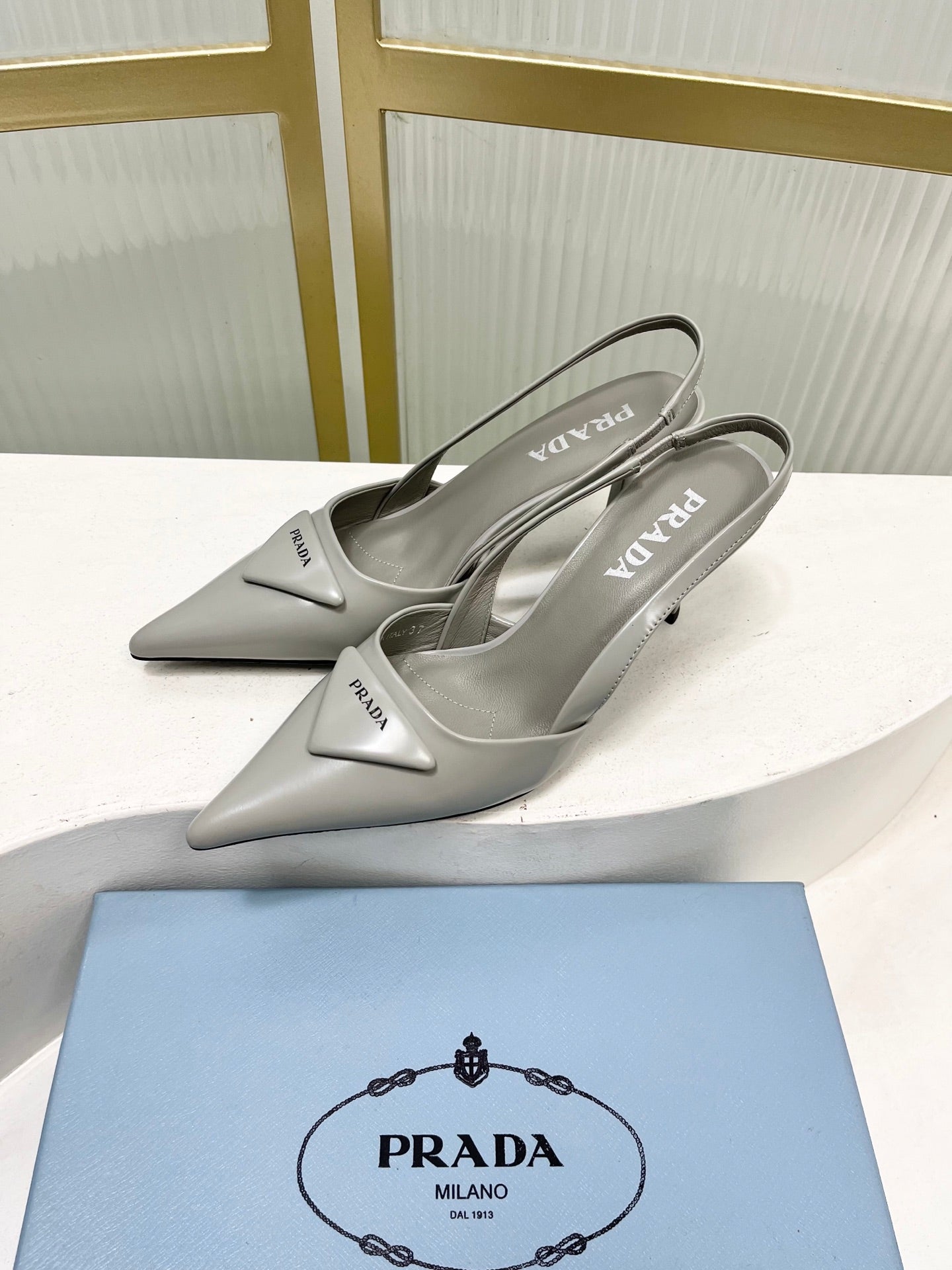 PRADA 26S SLINGBACK HIGH HEEL SANDALS 75MM IN LIGHT GRAY CALFSKIN WITH LOGO