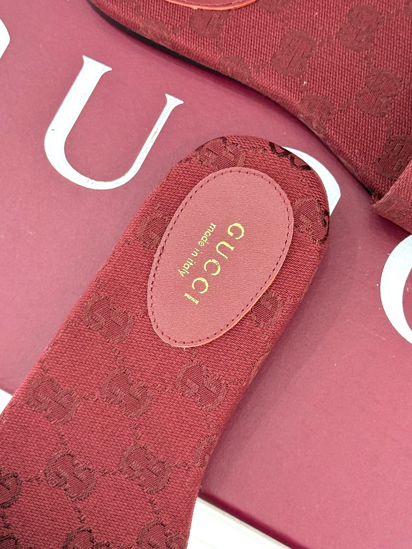 SLIDE SANDALS IN RED FABRIC EMBOSSED LOGO