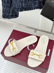 SLIDE SANDALS IN WHITE CALFSKIN WITH GOLD HARDWARE
